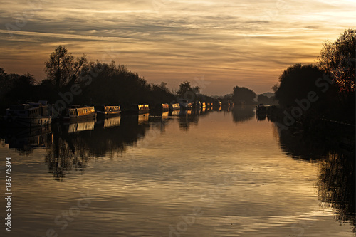 Fotografia, Obraz Sunset over the Gloucester and Sharpness Canal from Patch Bridge, Slimbridge, Gloucestershire, England, UK