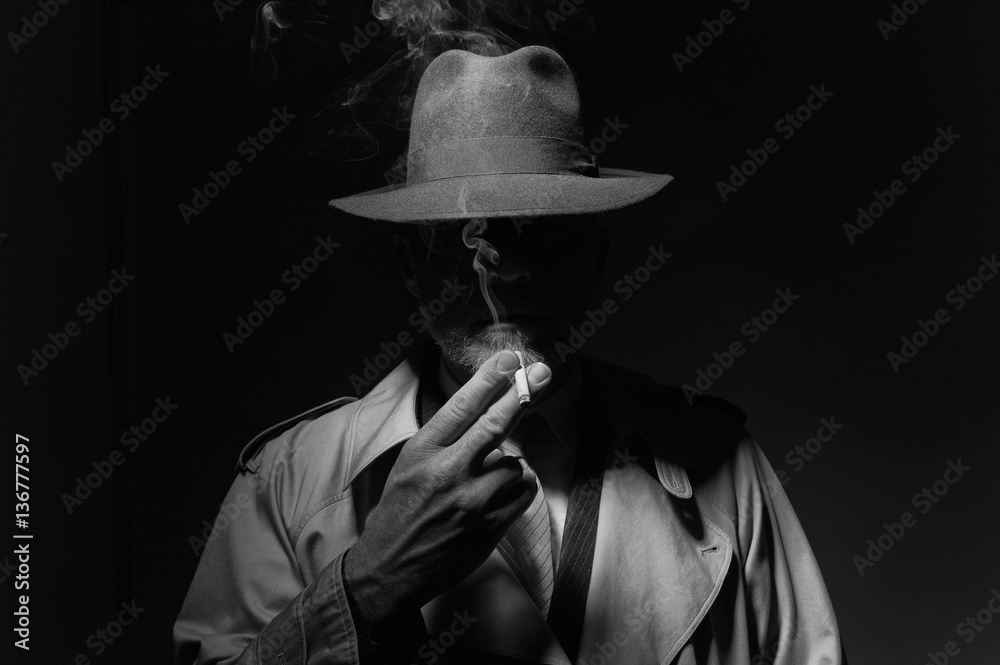 cigarette cinéma Noir film character smoking a cigarette Stock Photo