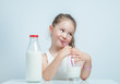 © Myst - beautiful cute little girl drinking milk with straw