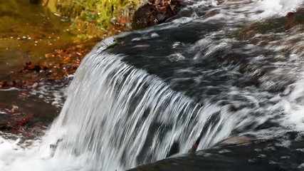 Wall Mural - Water splashes over Clinton Falls, a small beautiful waterfall in rural western Indiana.