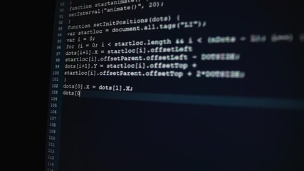 Fototapete - Computer class. On the monitor initial codes are entered. When developing the software by several developers, it is better to adhere to one standard of coding.