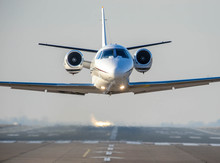 Business Private Jet In Low Level Flight