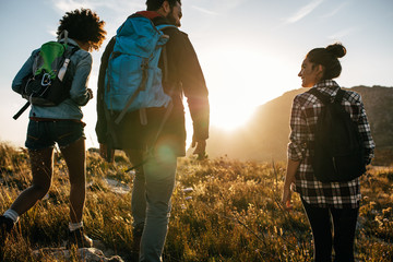 young friends on countryside hiking
