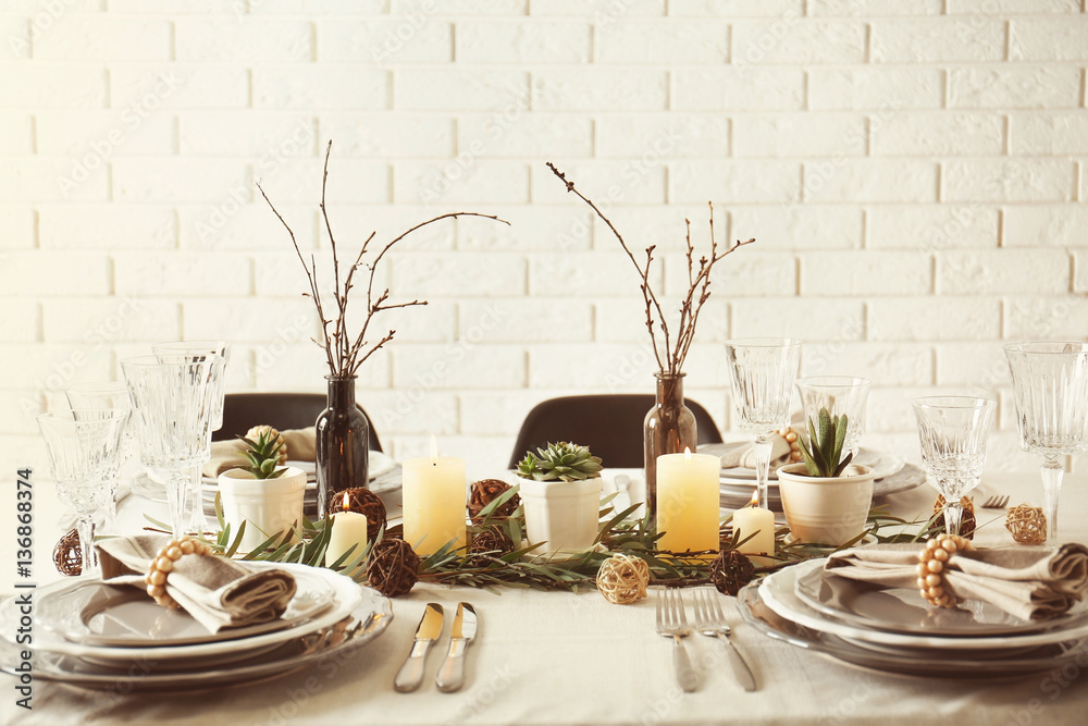 Table served with succulents for dinner in living room