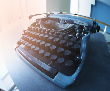 Old typewriter on the table, closeup