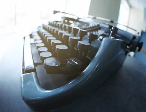 Old typewriter on the table, closeup