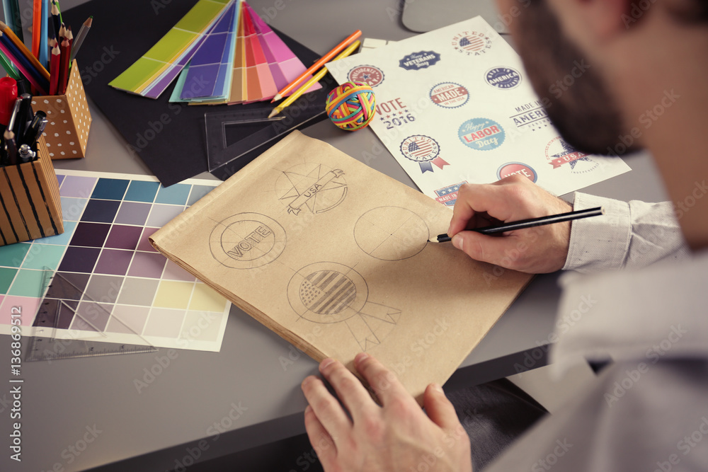 Male designer working in office