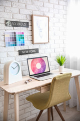 Sticker - Modern workplace with laptop and plant on table