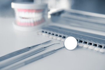 Canvas Print - Dentist equipment on white table