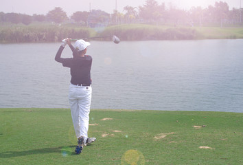 Wall Mural - Women's golf is a sport that requires endurance.