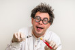 Crazy scientist performing experiments in laboratory