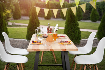 Poster - Table with food and drinks served for picnic