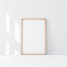 Wooden Frame With Poster Mockup Standing On The White Floor. 3d Rendering