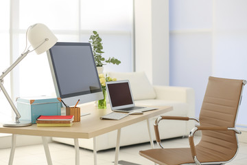 Poster - Workplace with computer and laptop on table in modern room