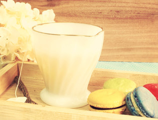 Canvas Print - colorful tasty macaroons with cup of tea