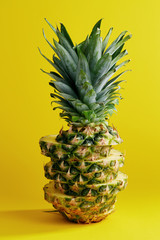 Wall Mural - Sliced Pineapple On Yellow Background