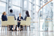 © pressmaster - Group of modern traders discussing sales level