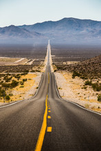 Endless Straight Road In Death Valley National Park, California, USA