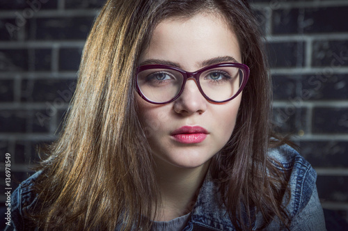 Portrait Of Beautiful Brunette Teen Girl Wearing Glasses