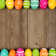 Poster - Colorful Easter egg double border against a rustic wood background