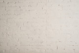 Fototapeta Kamienie - кирпичная стена покрашена в белый цвет 