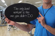 © dream@do - Personal fitness trainer holding workout inspiration motivation quote on blackboard.