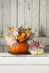 Canvas Print - Bouquet of flowers in pumpkin