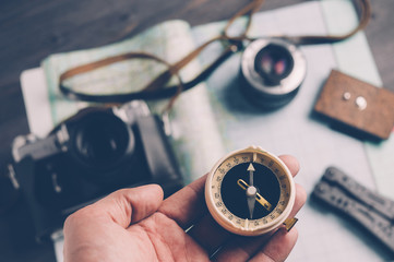 Wall Mural - Old compass and photo equipment. Travel concept