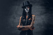 © Fxquadro - A woman with painted skull face.