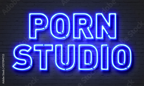 Porn Studio Neon Sign On Brick Wall Background Porn Studio Neon Sign On Brick Wall Background