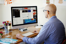 Mid-adult Man Surfing Internet