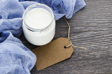 Fresh homemade yogurt  on old wooden table