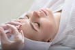 © jutaphoto - Young woman gets beauty facial injections in salon.