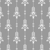 Bohemian seamless vector pattern. White on gray tileable navajo background.