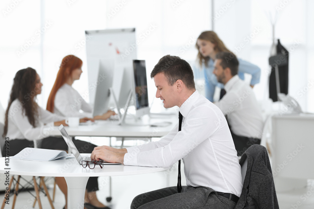 Man working on computer at modern office