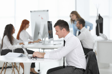 Poster - Man working on computer at modern office