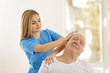 © Africa Studio - Physiotherapist working with elderly patient in clinic
