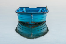 Wooden Fishing Boat On A Background Of Water