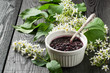 Medicinal plant bird cherry (flowering branches and jam)