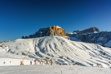 Sunny view of ski slope at Col Rodella valley near Canazei of Val di Fassa, Trentino-Alto-Adige region, Italy.