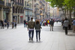 © Jne Valokuvaus - Couple walking down the streets of Barcelona, Spain. Light tilt shift effect.