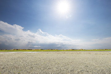 empty ground in blue sunny sky