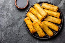 Fried Spring Rolls On Iron Plate. Top View