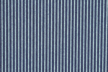 dark blue denim with teal stripes fabric background