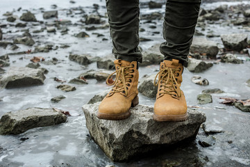 hiking boots and jeans walking