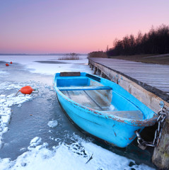 Canvas Print - Fischerboot überwintert im See