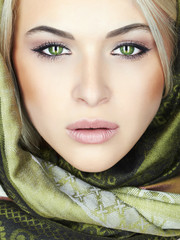 Wall Mural - beautiful woman with green eyes