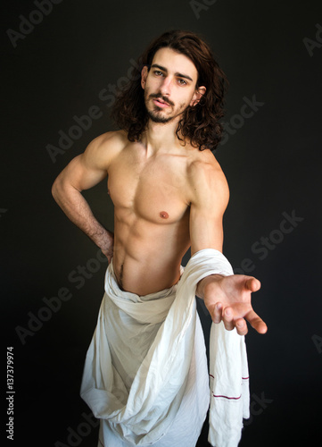 Beautiful Half Naked Guy With Curly Hair In A White Drapery A Photo Stock Photo Adobe Stock
