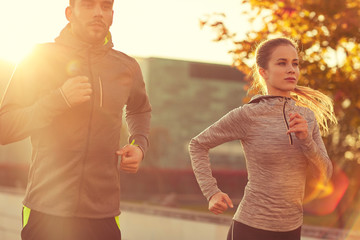 Canvas Print - couple running outdoors