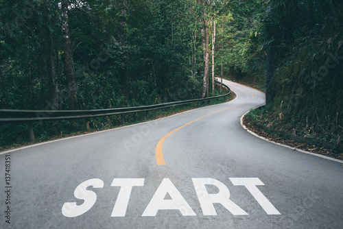 Fotomural Startup to success business printed on road leading towards future concept